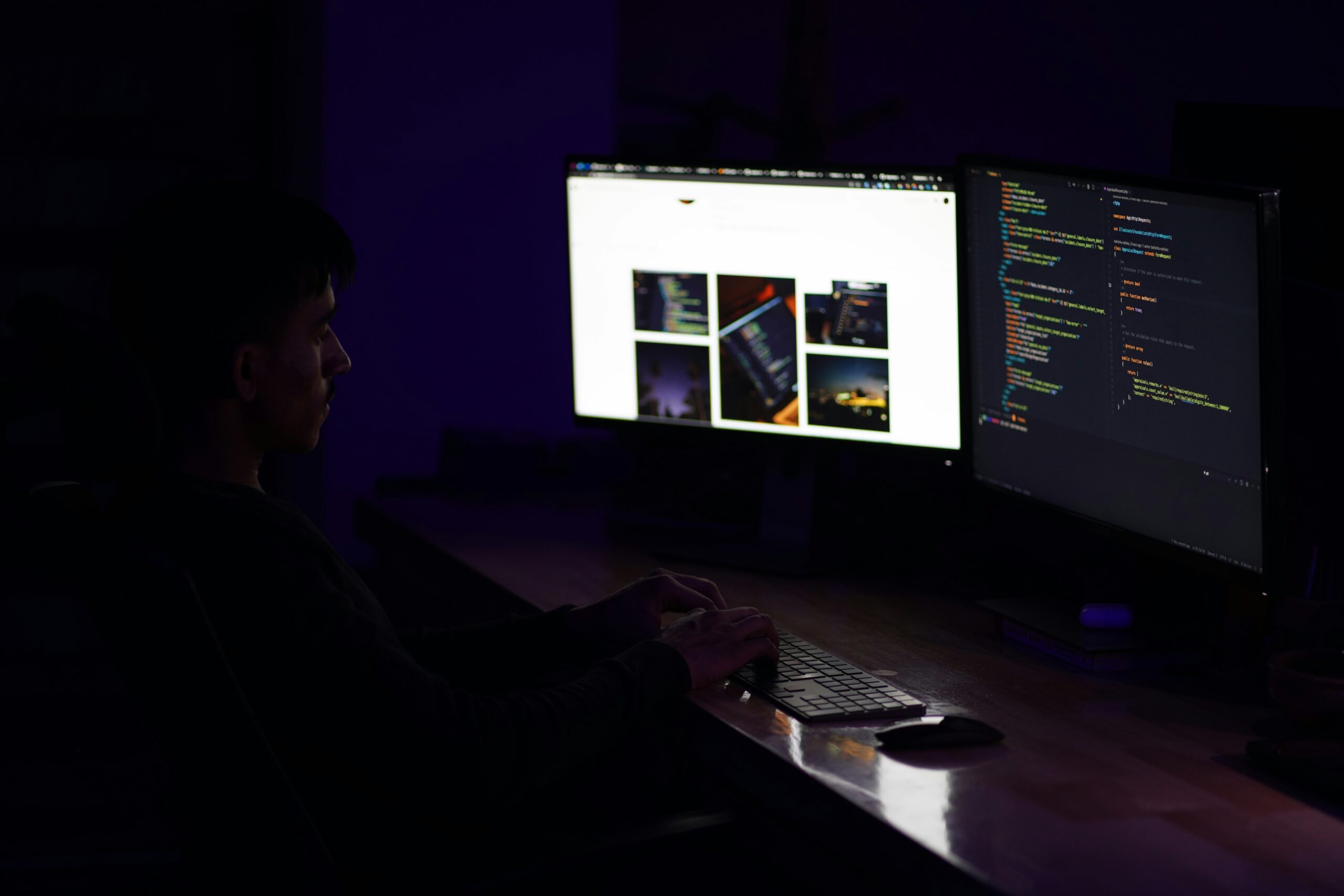 a man sitting at a desk with a computer