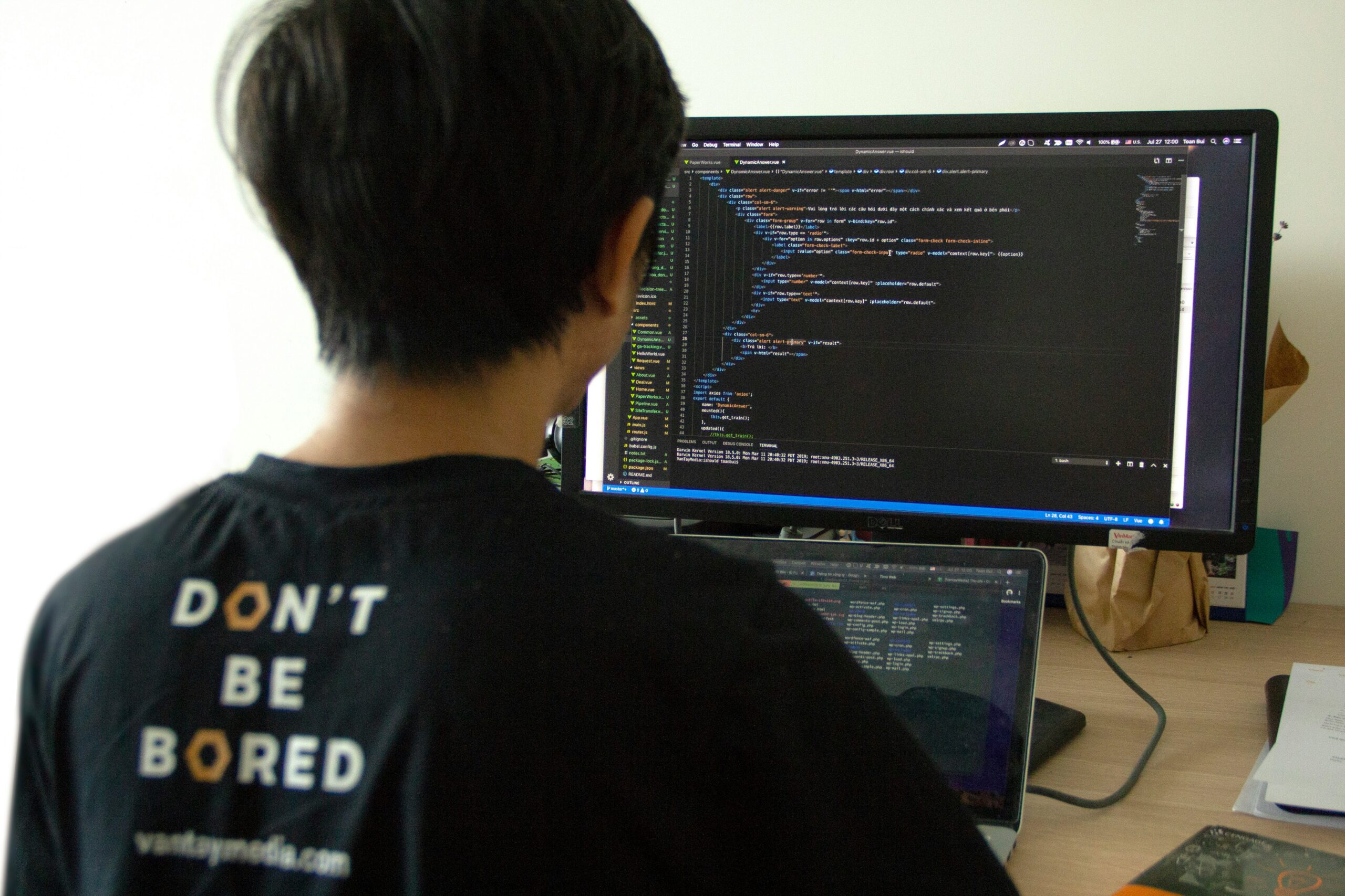 a man looking at a computer screen