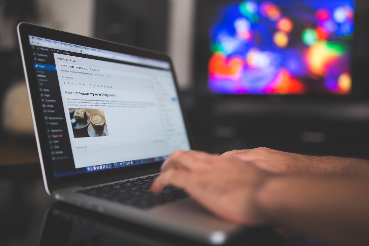 a person typing on a laptop